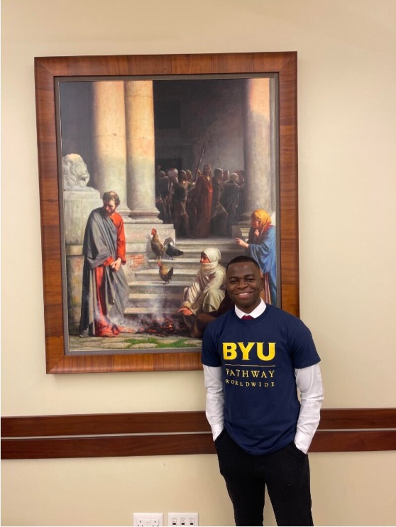 Victor wearing a BYU-Pathway Worldwide shirt